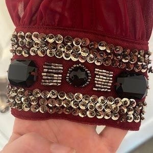 Dark red fancy blouse with embellished cuffs. Size Medium